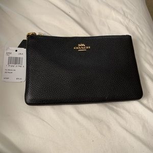 Coach leather pouch.